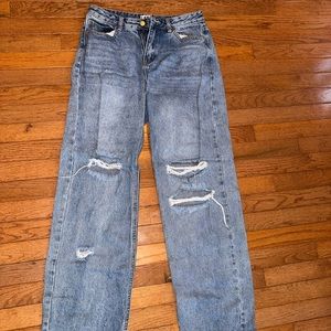 I am gia jeans, ripped at knee